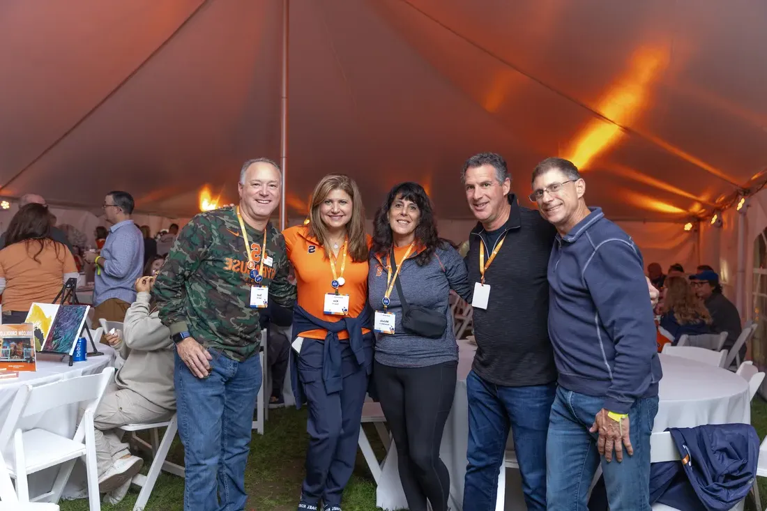 Alumni at a Forever Orange event.